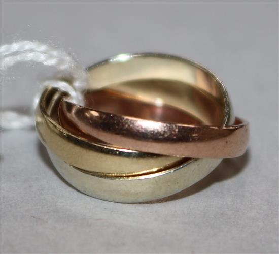A 9ct three colour gold triple Russian wedding ring, size E.